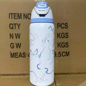 Brand-new Owala FreeSip 32oz Water Bottle in the Tied & True Blue Bows